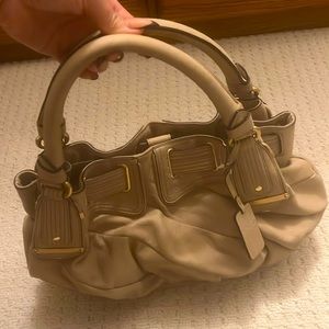 Juicy Couture tan leather over the shoulder bag